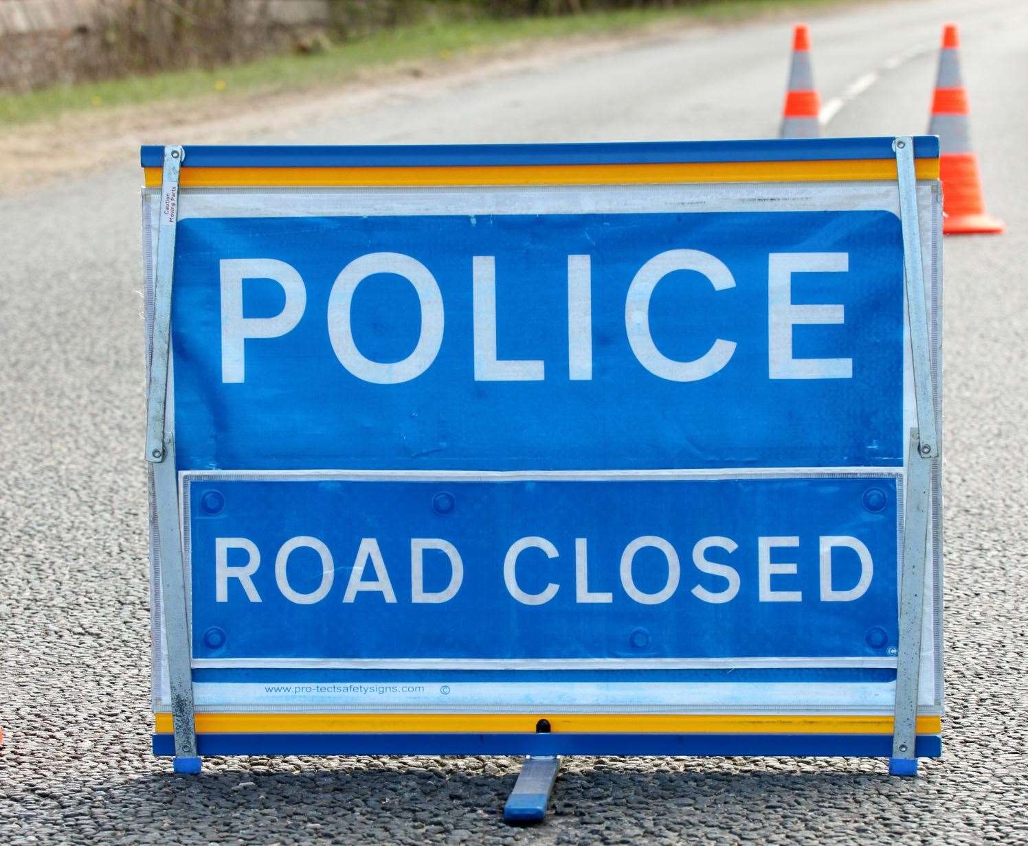 Police road closed sign.