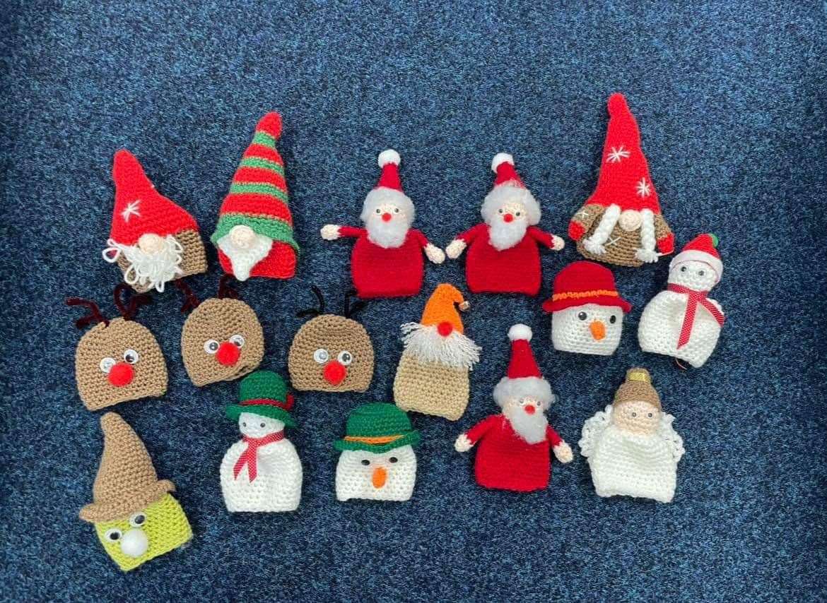Some of the covers created by the BHive Community Hub Knit and Natter group.