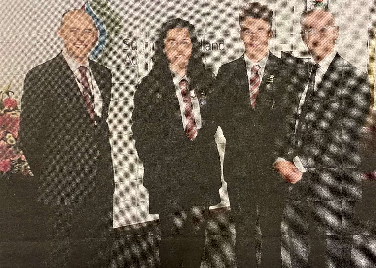 From left, Anthony Partington, head girl and boy Phoebe Carroll and Iain Brockbank and Lord Norton 10 years ago.