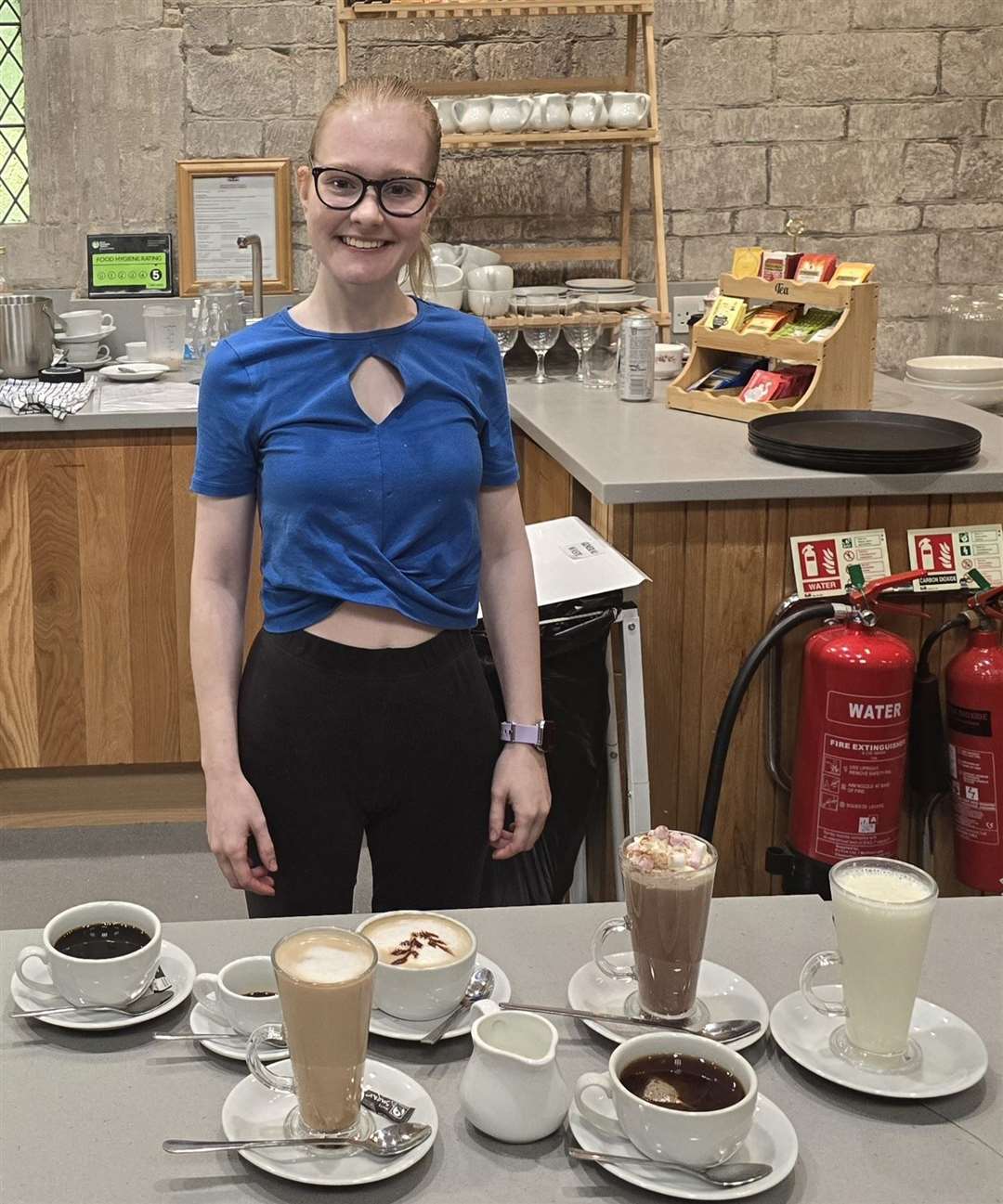Annie showing off her new barista skills