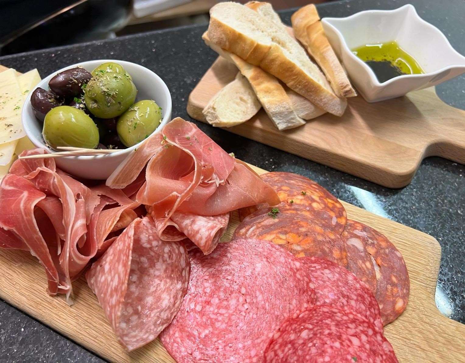 The Italian way - olives, bread and cold meats. PHOTO: SUBMITTED