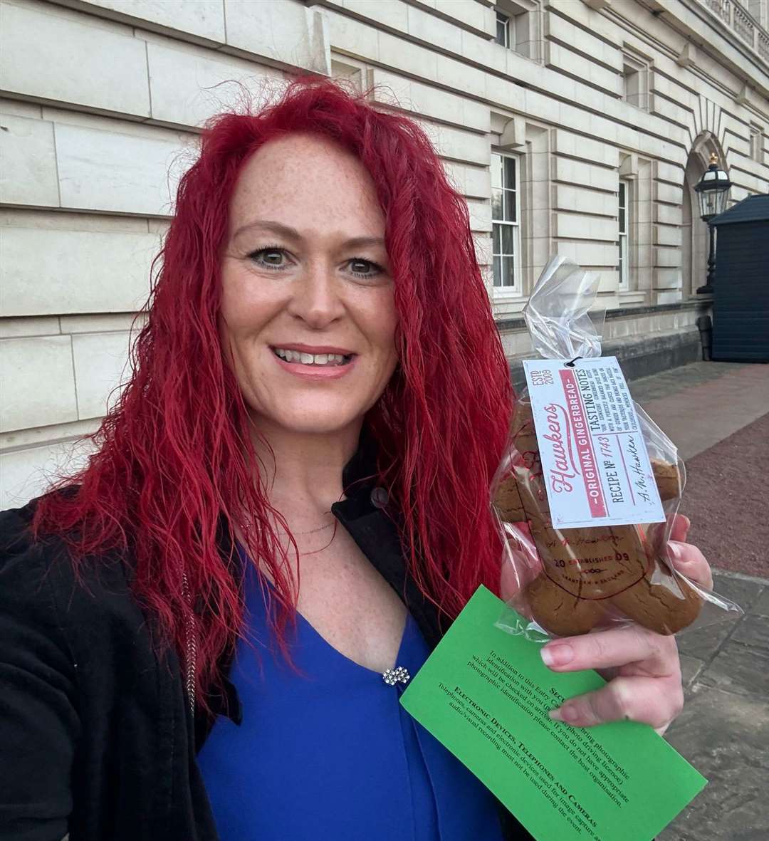Suzie Stevens at Buckingham Palace with Hawken's Gingerbread.