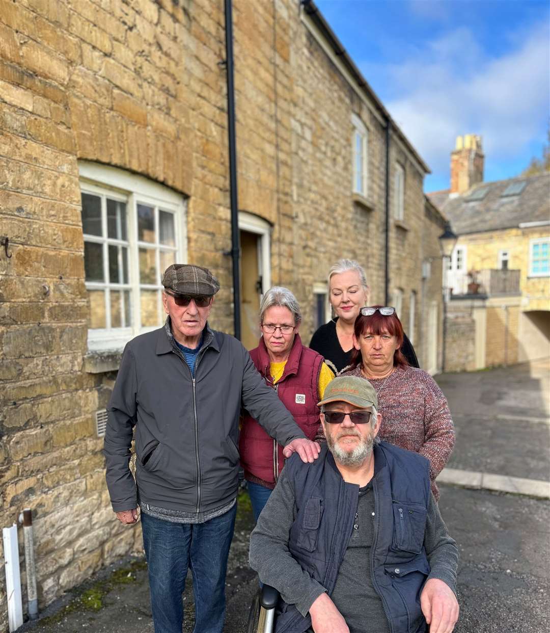 Derrick Middleton, Sheen Ogle, Madeline Nelson, Suzette Waldron and Paul Robinson outside their homes in Lumby’s Terrace, Stamford