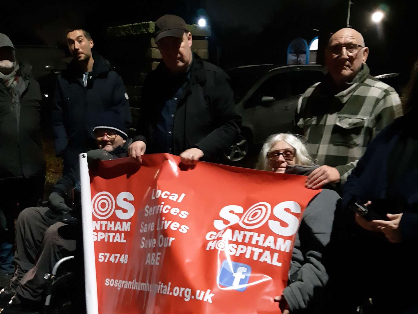 People attend the SOSGrantham Hospital vigil on the day A&E was replaced by an urgent treatment centre.