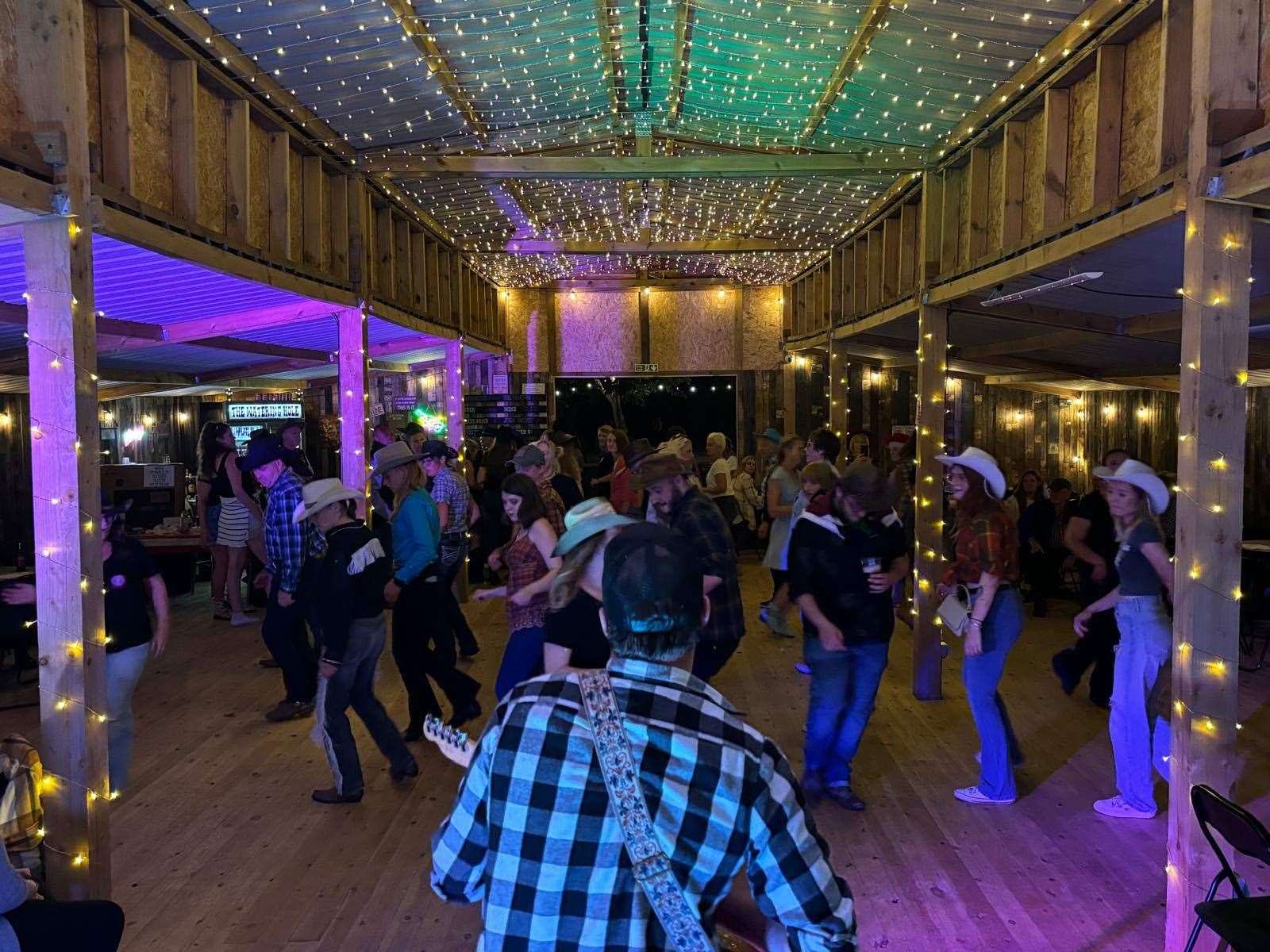 Line dancing is a popular activity at The American Barn.