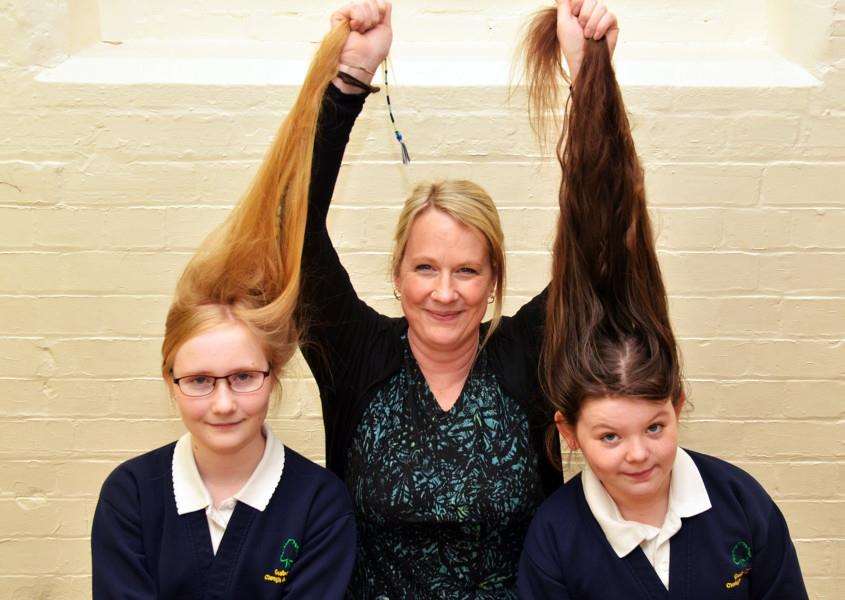 Gosberton Clough and Risegate School, girls with long hair'Alex-ava Hitchens (10) and Natalie Greenhalgh (11 blonde hair) with Tracy Greenhalgh