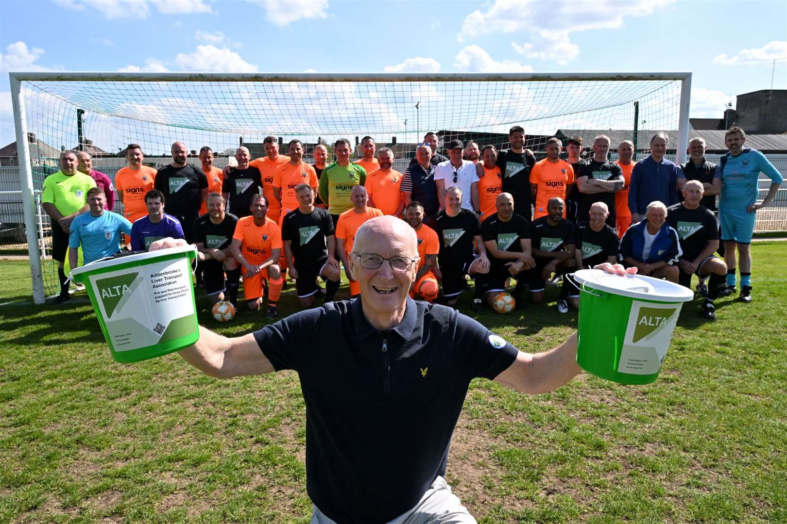 Kevin Boor with both teams, whose participation helped generate more than £2,885 for Alta, the charity supporting liver transplant patients at Addenbrooke's Hospital, Cambridge