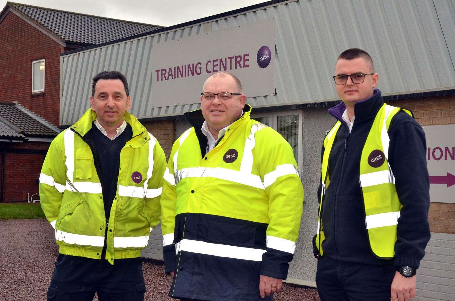 General manager Steve Reid, centre, with trainers Den Allaway and Bogdan Tiganus