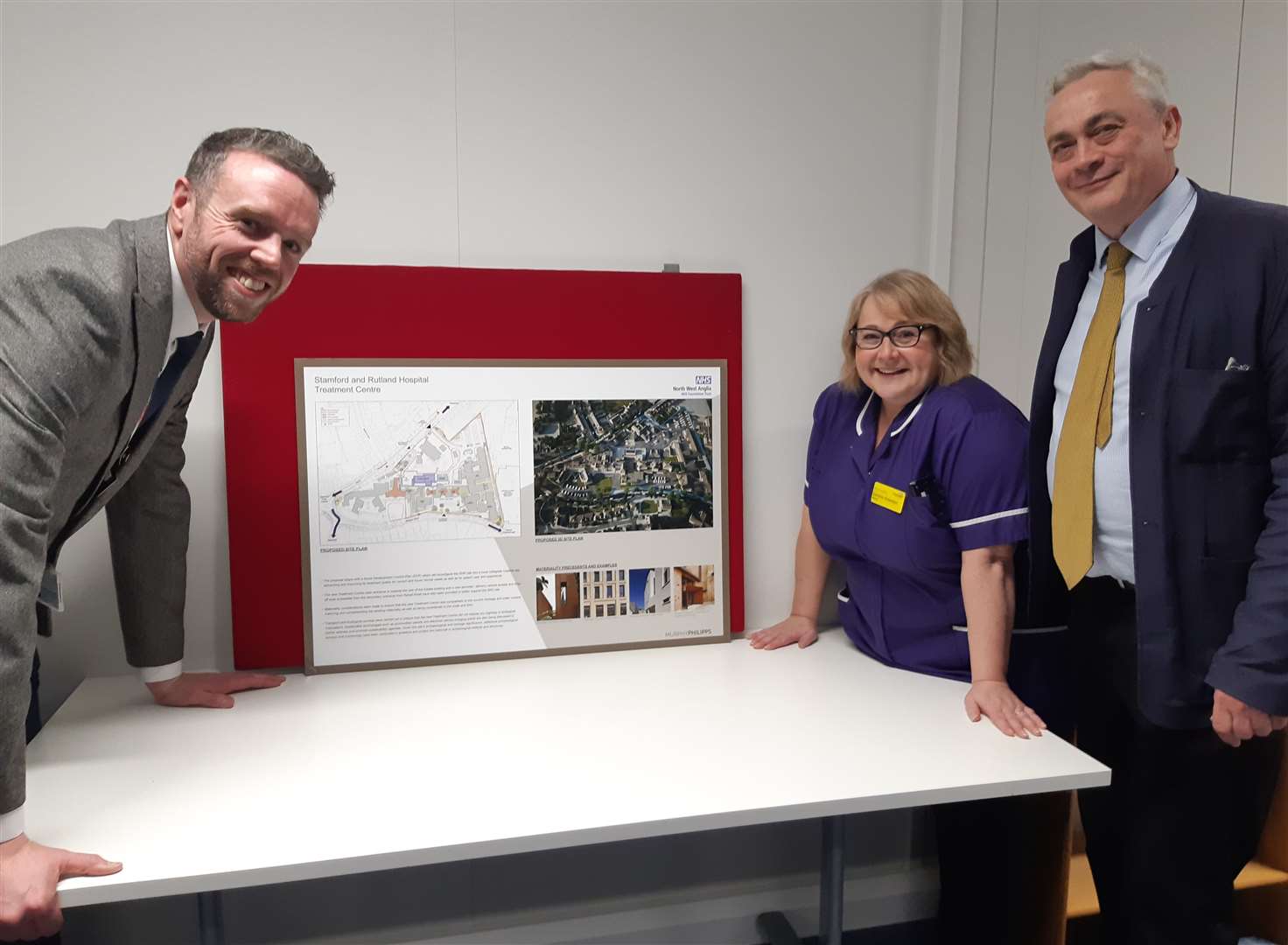 Senior project leader Chris Howard, matron Caroline Robertson, and architect Clive Guyer with plans for the new treatment centre