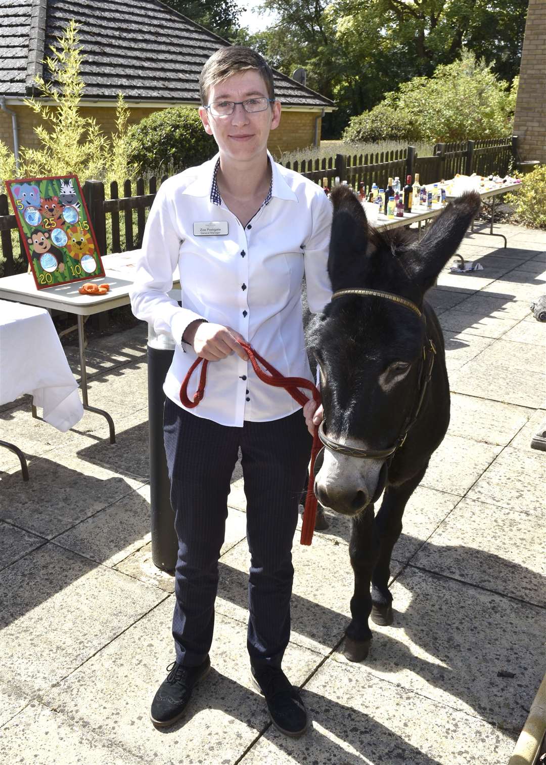 Manager Zoe Postgate with one of the visiting donkeys (3588790)