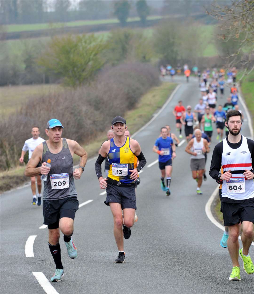 Andy Hauton from Nettleham Trotters in bib 209, Neil Lakin from Stamford Striders in bib 13, and Martin Dennis from Lincoln Wellington in 604. Photo: Chris Lowndes