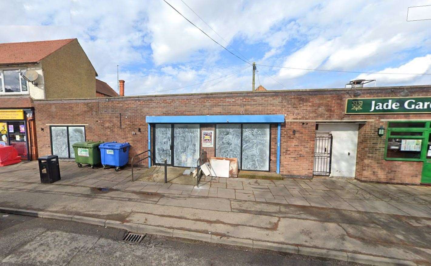 The empty unit at 39 Abbey Road in Bourne is between Sam’s Premier convenience store and the Jade Garden restaurant. Photo: Google