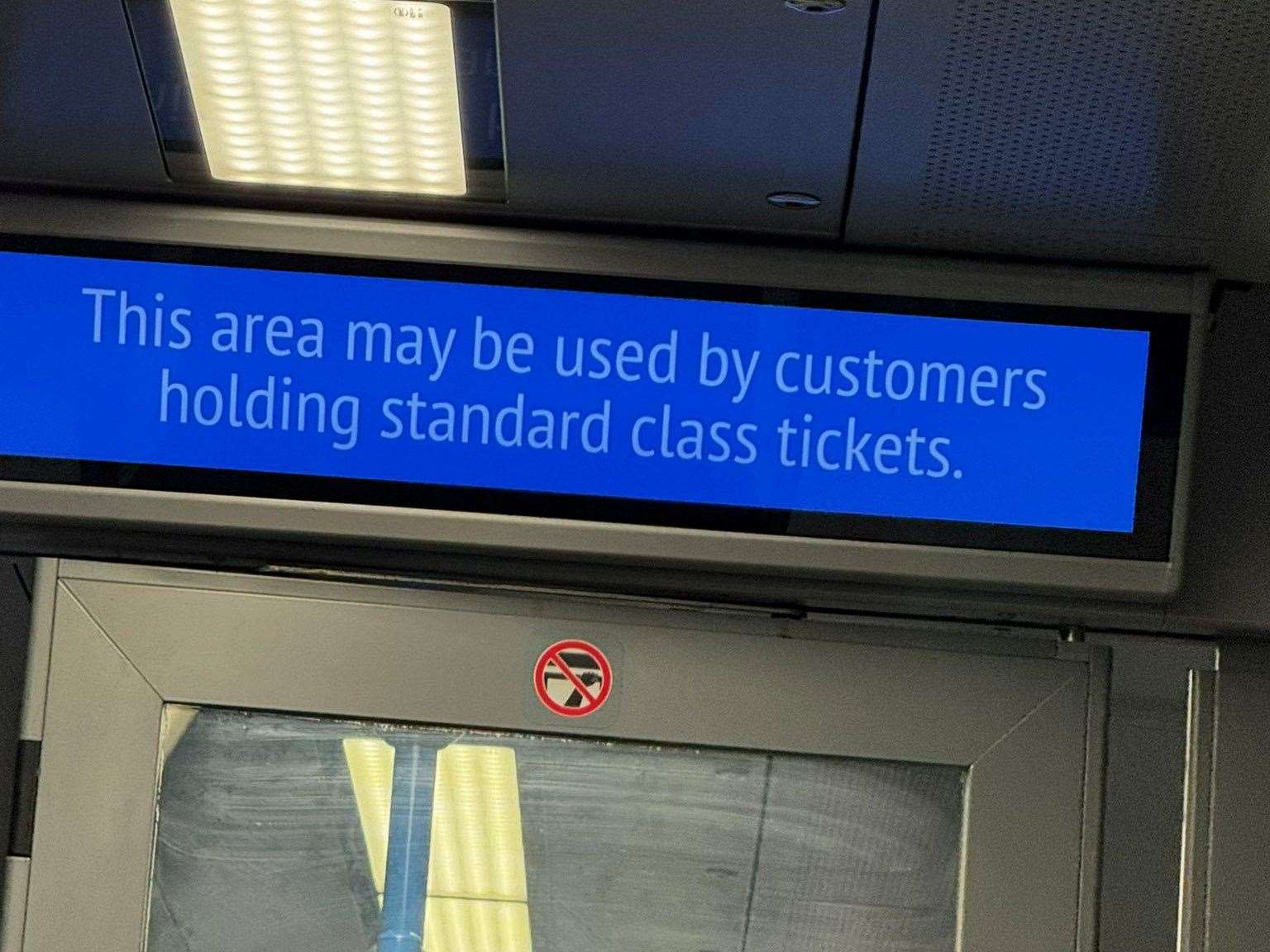A sign on the train that confused Theo