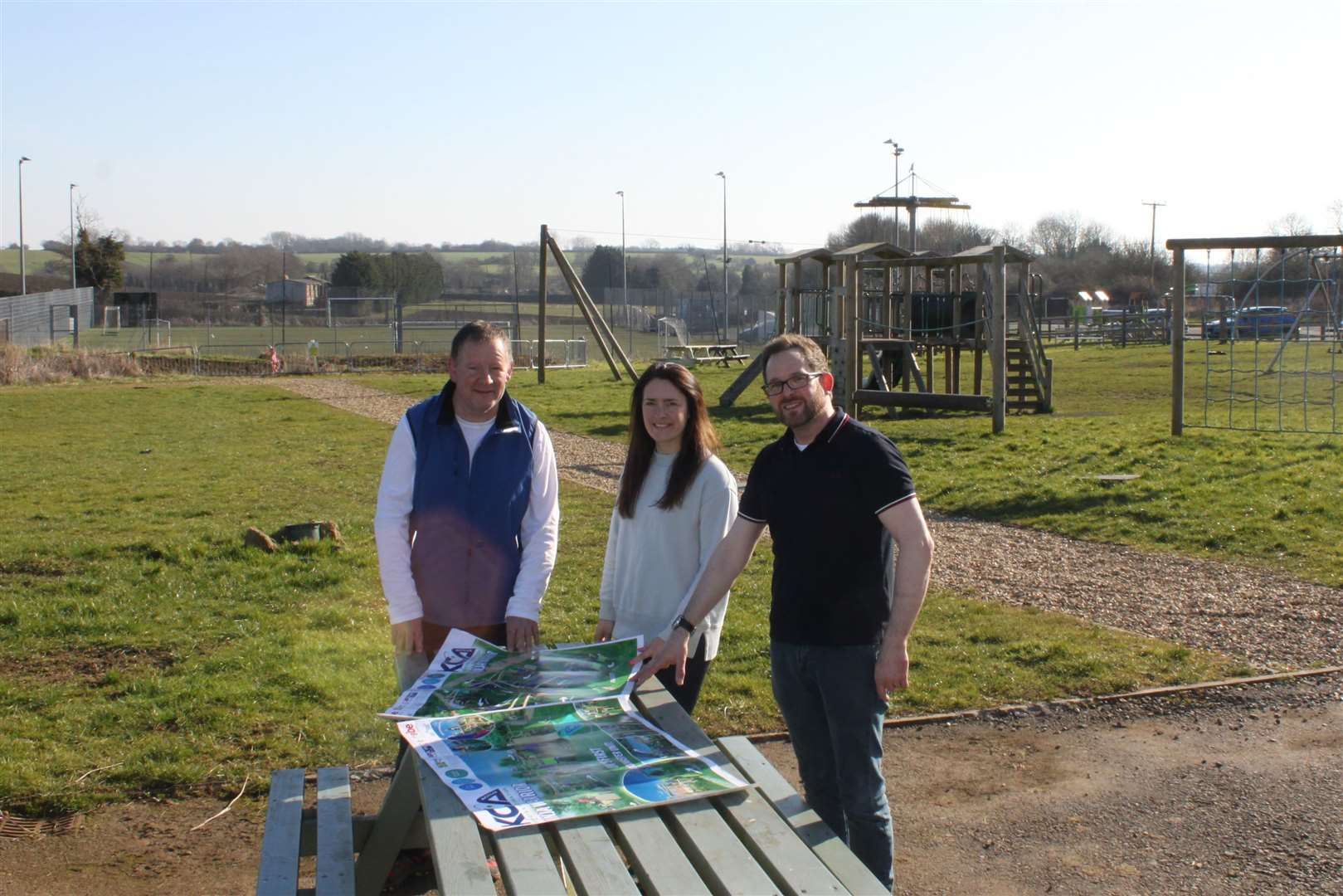 Past chairman of the trustees Simon Fairhall, left, with present trustee Cat Raitt and chairman Guy Varty at the site of the proposed new play equipment