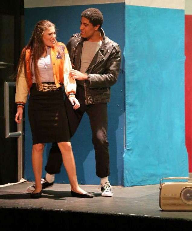 Kayleigh Waterman performing in a Stamford Endowed Schools production of Grease alongside Declan Spaine, who is currently playing Alexander Hamilton in the West End production of Hamilton