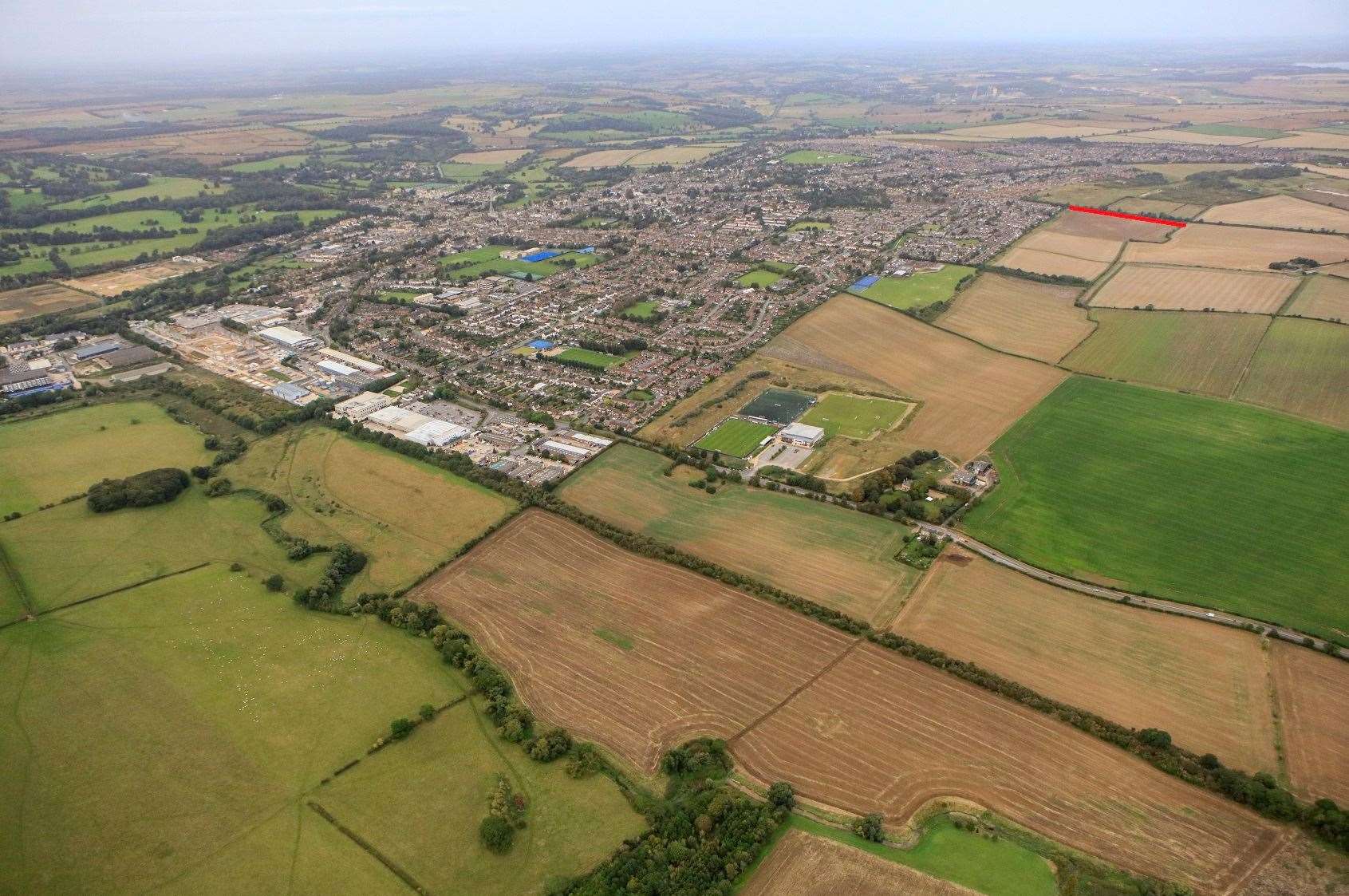 An aerial view of the site of Stamford North. Little Casterton Road (marked in red) is the boundary with the Quarry Farm site