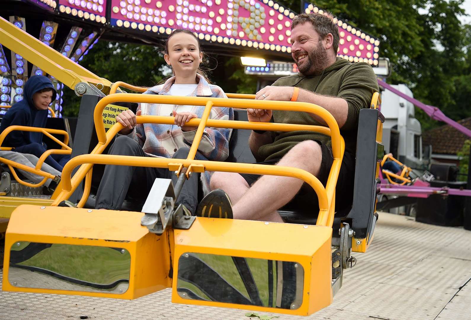 All smiles on the fairground rides.