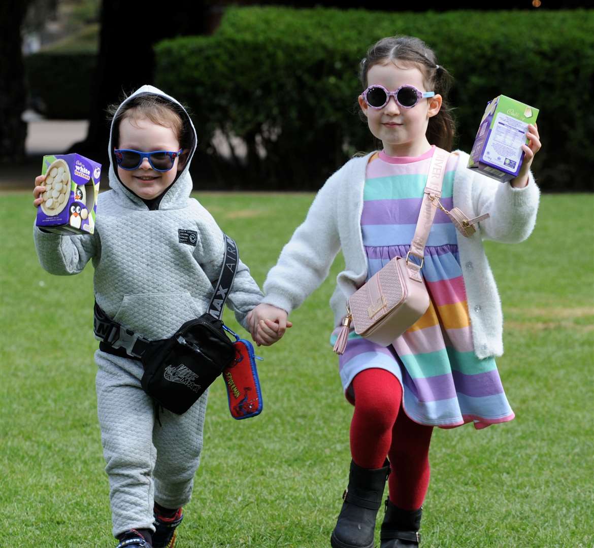Nancy, 4, and George, 2, Eve are egg-cited on the hunt. Photo: Chris Lowndes