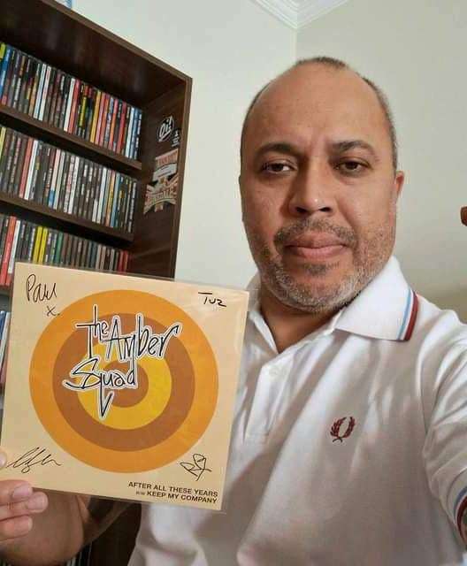 Fanzine owner Carlos Pardo with his signed single