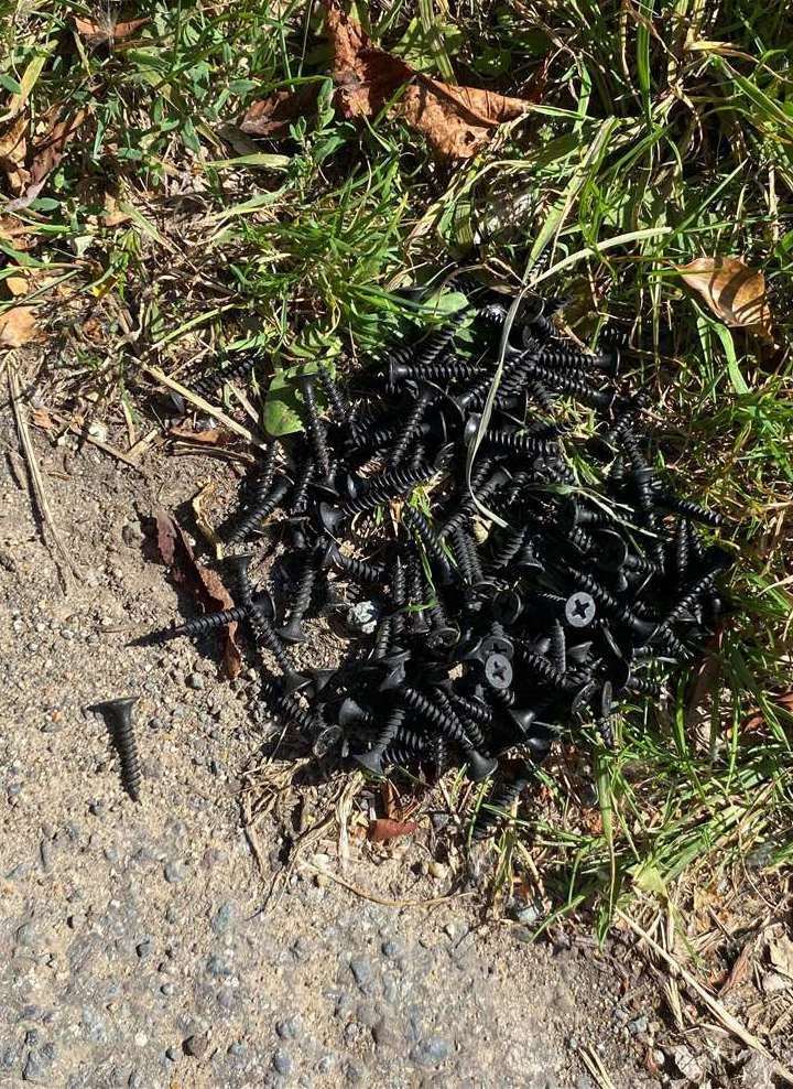 Nails beside the road - these have caused punctures to residents' tyres