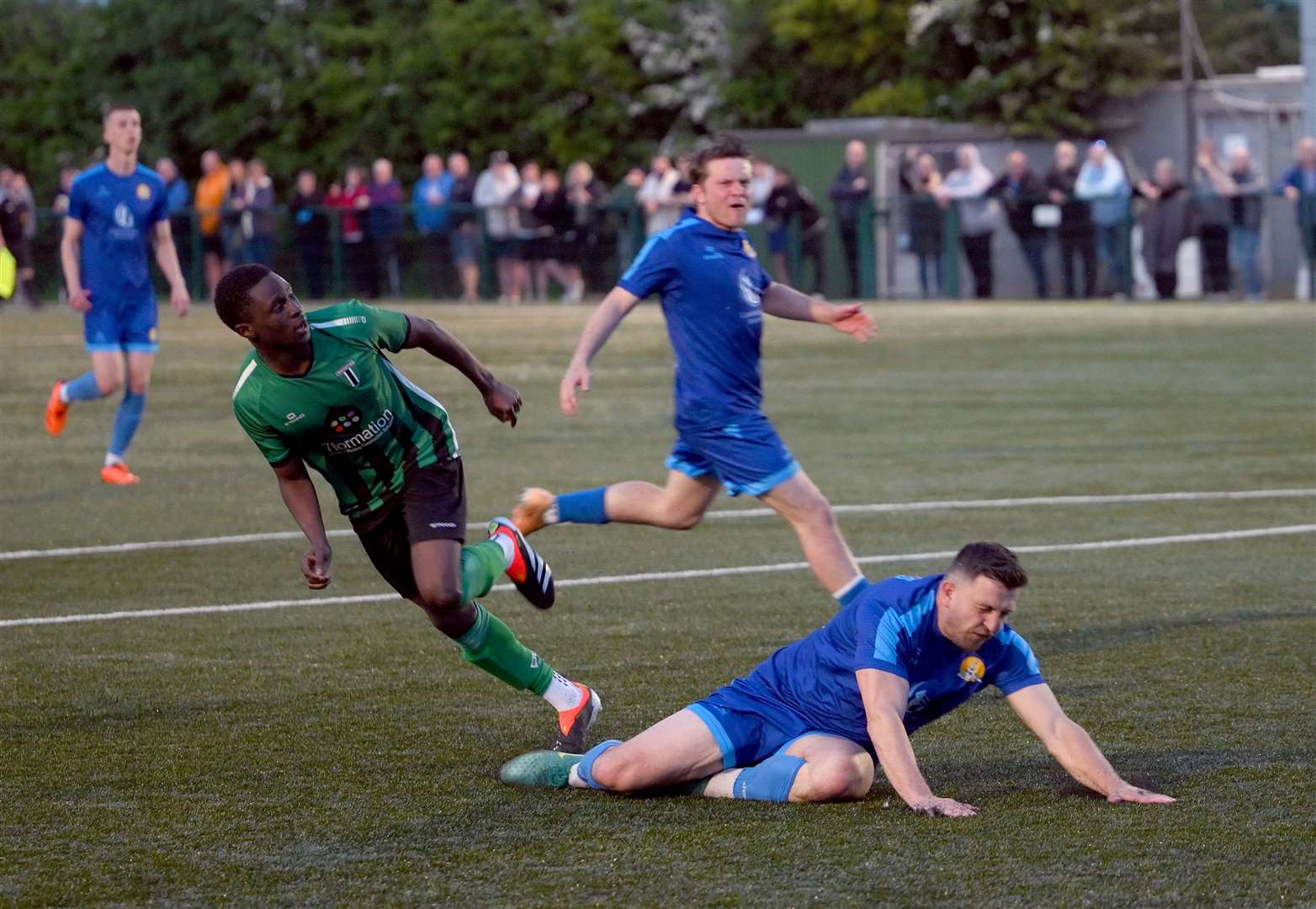 March (Blue) v Blackstones (Green and Black) in the final of the Hinchingbrooke Cup Blackstones scoring to make it 1-1