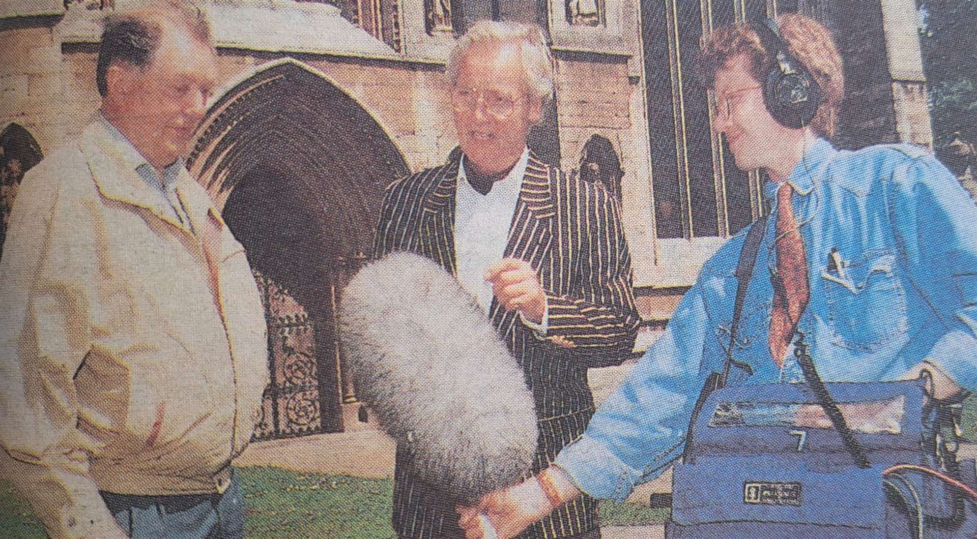 Nicholas Parsons (centre) chats to Malcolm Knapp outside St Wulfram's Church while Radio 4 sound engineer Ian Hunter listens in.