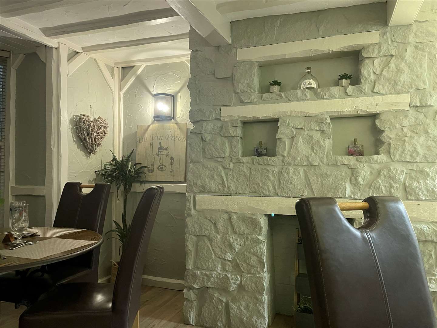 The decor is a clash of old and new with a cosy, warm feel