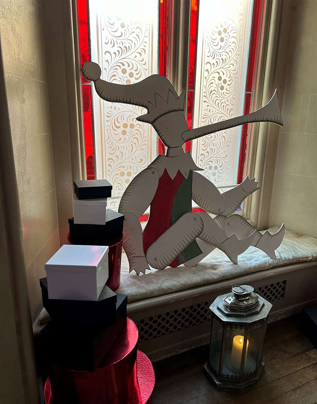 A piper in the window