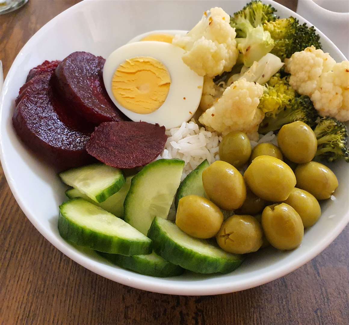 My poke bowl of rice, beetroot, egg, olives, broccoli, cauliflower and the hotly debated cucumber